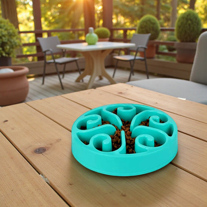 gamelle anti glouton turquoise dans la terrasse